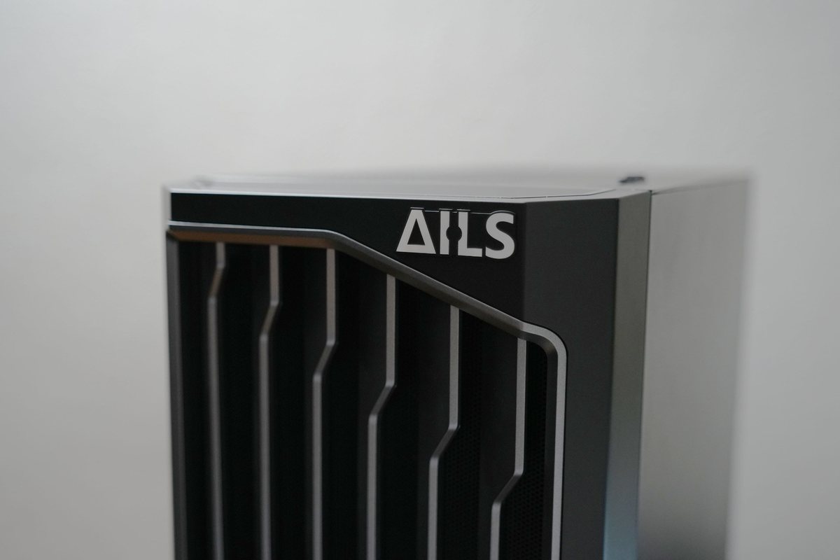 Close-up photo of the AILS logo and top chassis